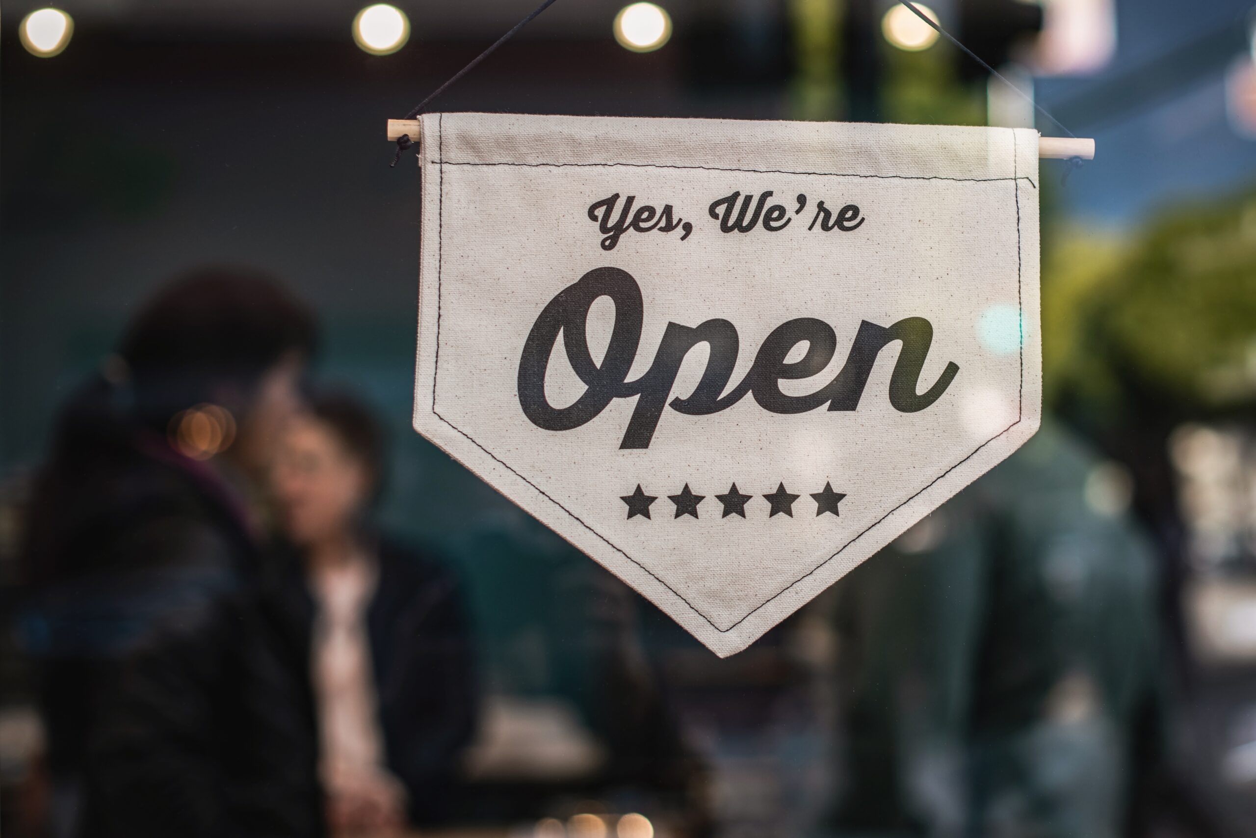 happy-young-asian-couple-realtor-agent-1 elegant open sign